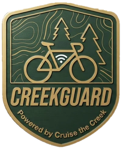 CreekGuard badge: a bike under two pine trees on a topographic map, Powered by Cruise the Creek